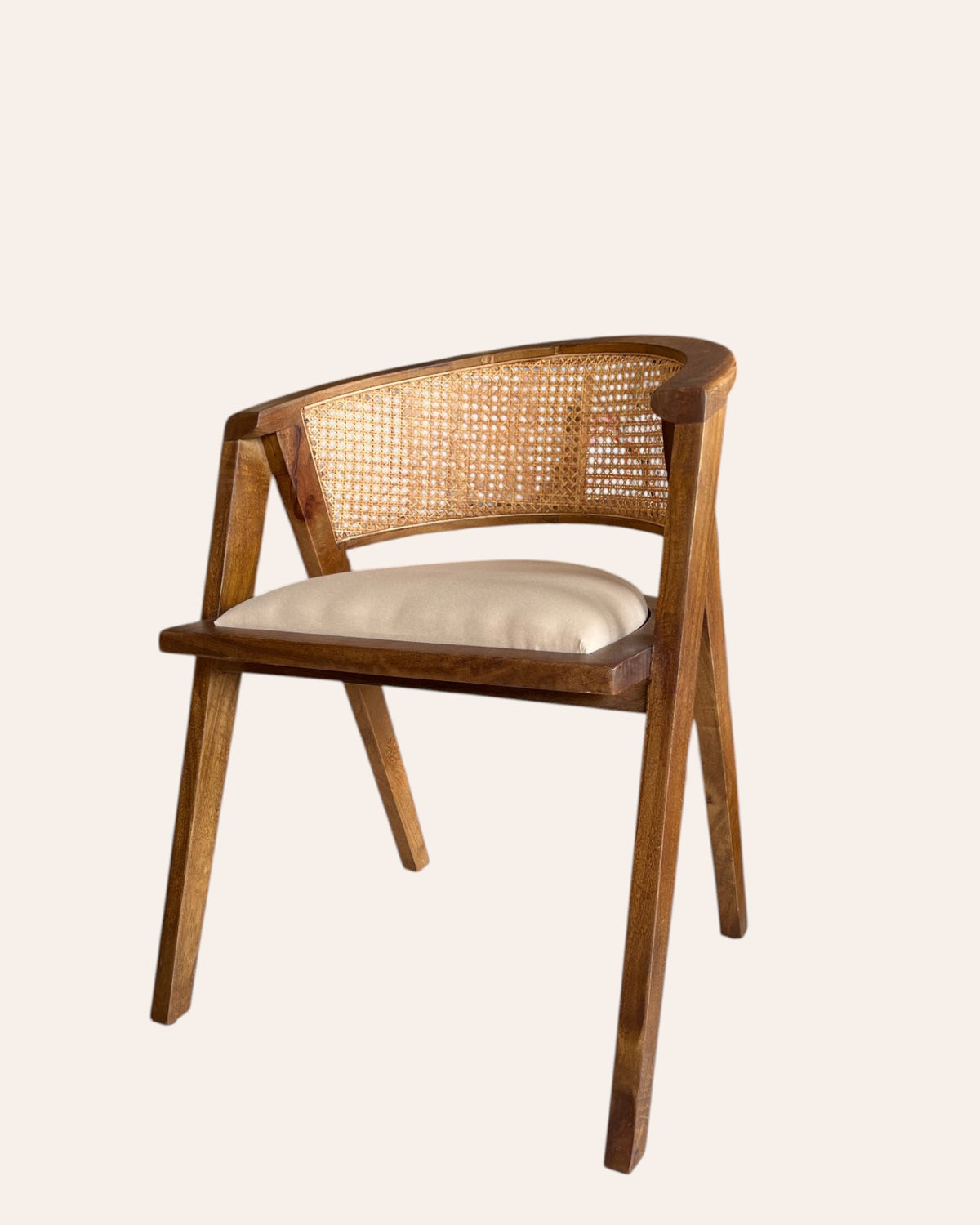 handcrafted wooden cane back armchair
