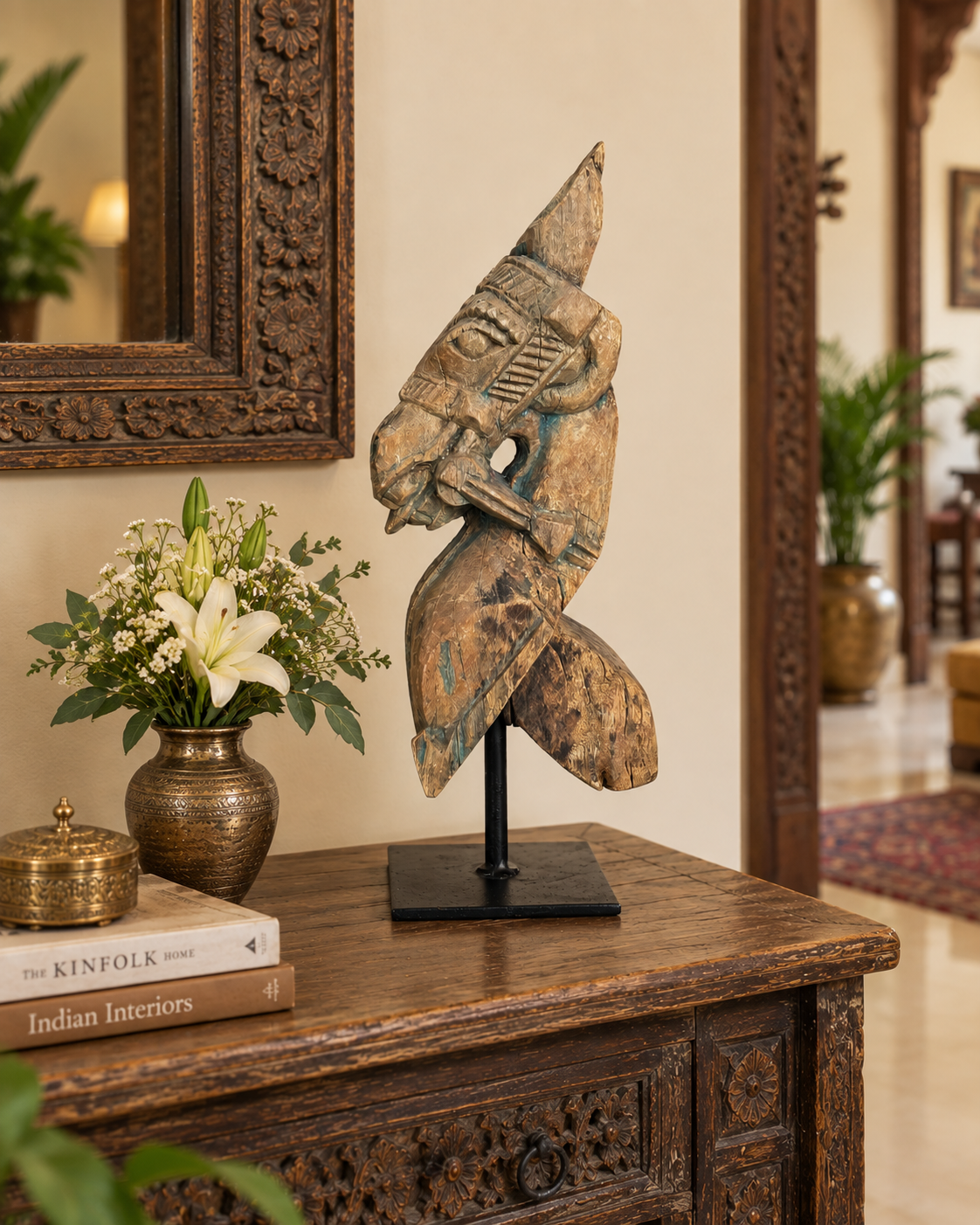 vintage distressed hand-carved wooden horse bracket on iron stand