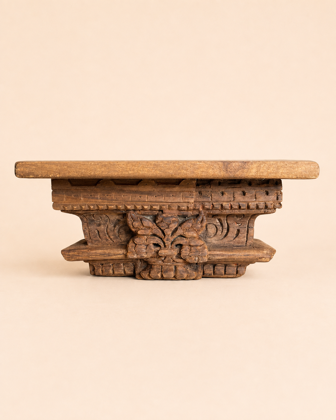 carved wooden shelf