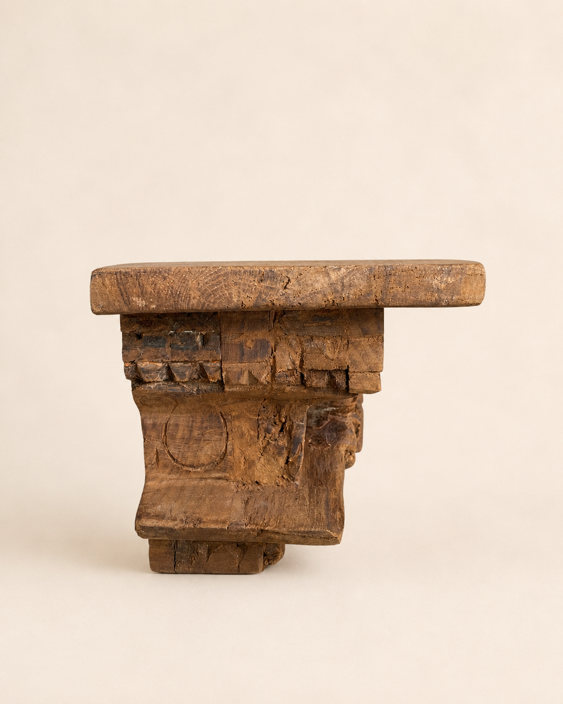 carved wooden shelf