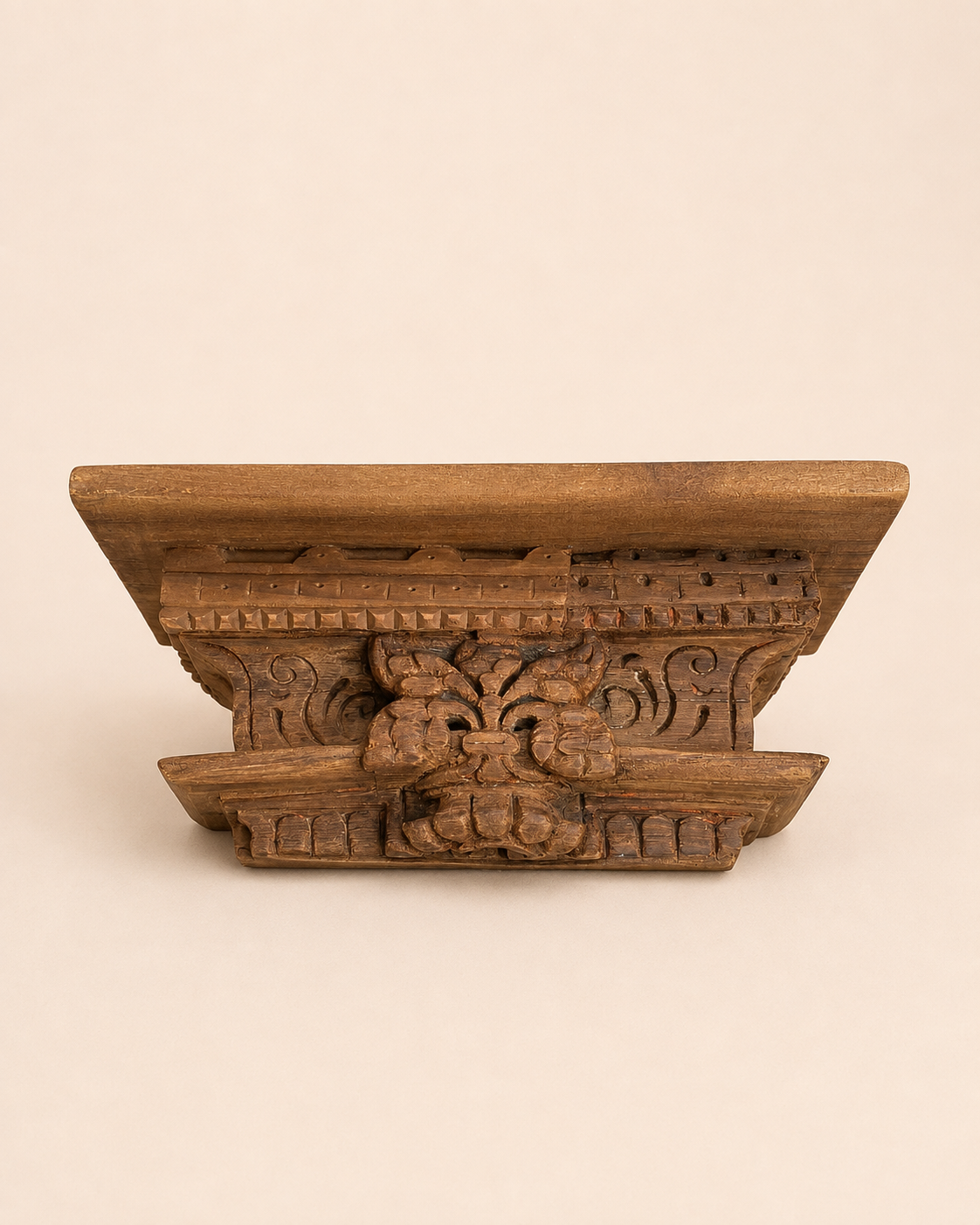 carved wooden shelf