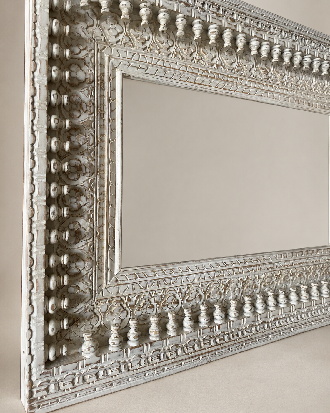 horizontal spindle detailing wall hanging mirror frame