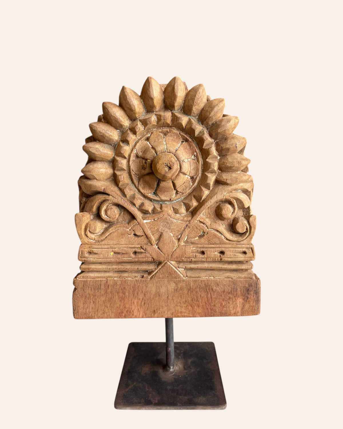 vintage hand-carved floral medallion on iron stand