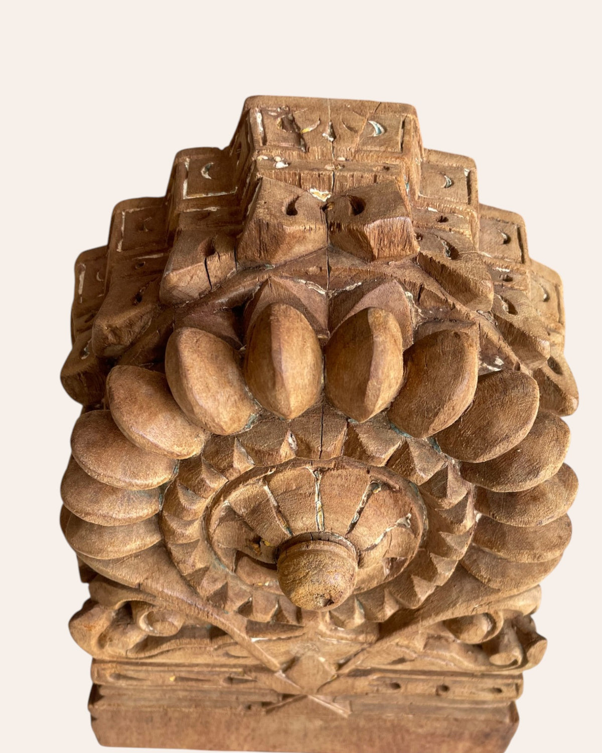 vintage hand-carved floral medallion on iron stand
