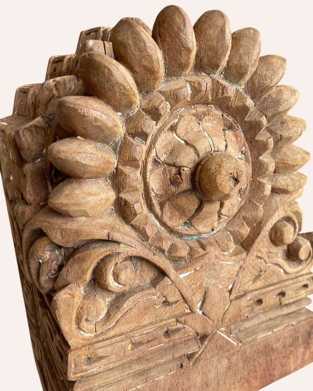 vintage hand-carved floral medallion on iron stand