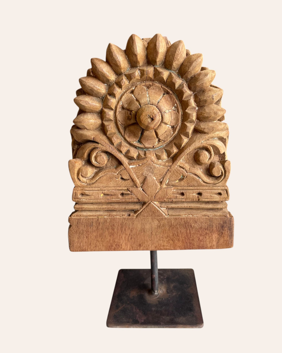 vintage hand-carved floral medallion on iron stand