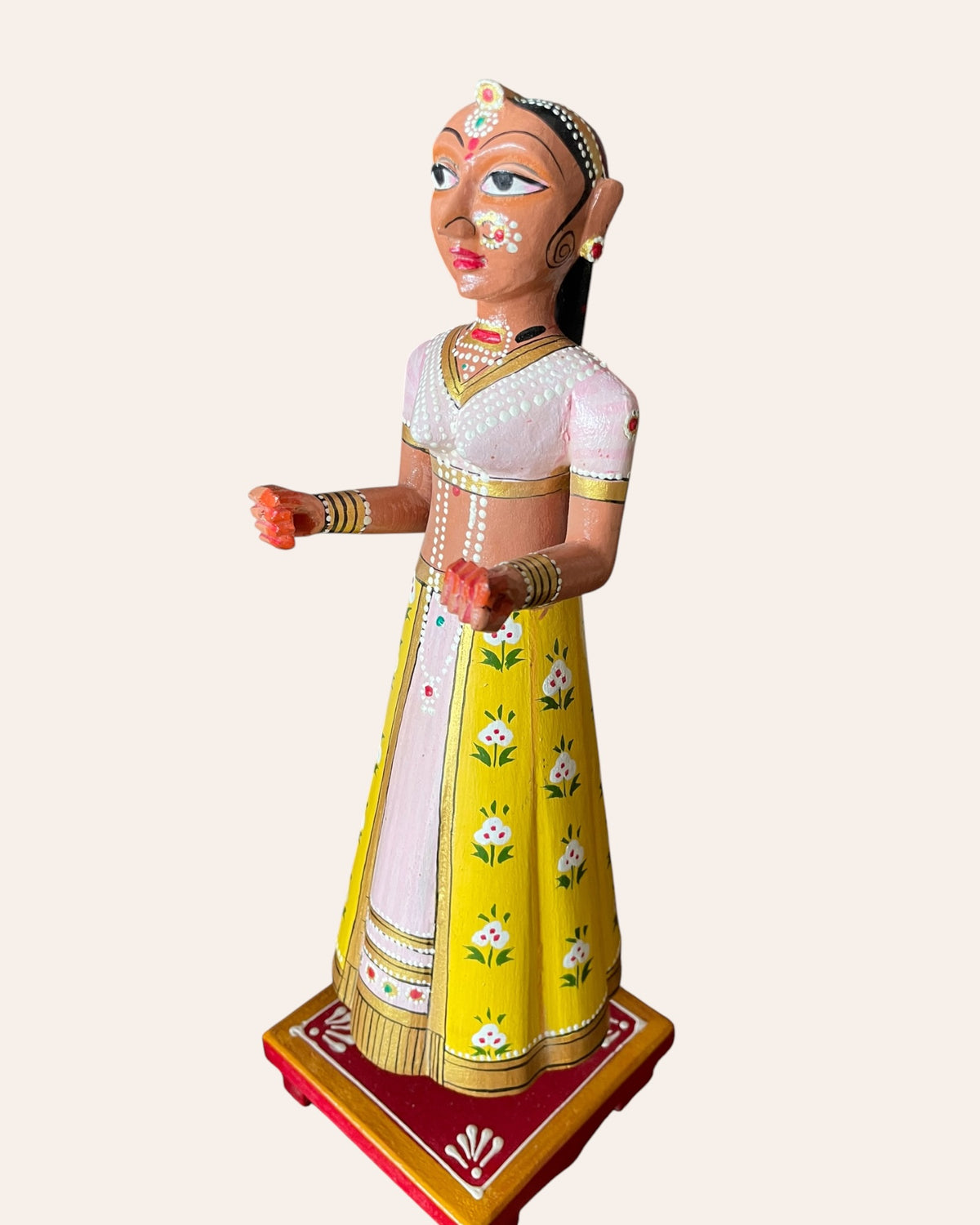 rajasthani heritage yellow hand-painted teak wood isar & gangaur figurines – set of 2