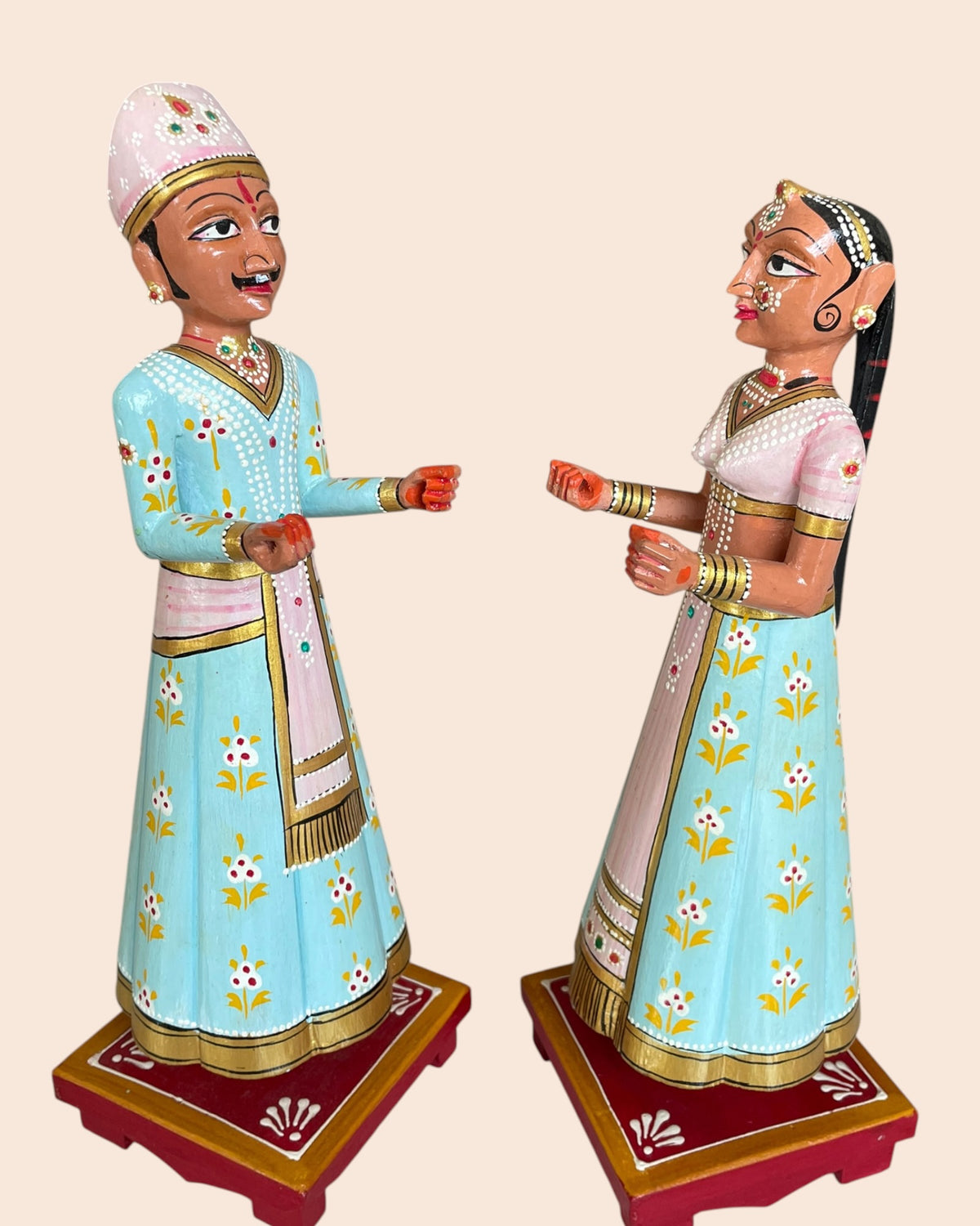royal pastel isar & gangaur hand-painted wooden figurines – set of 2