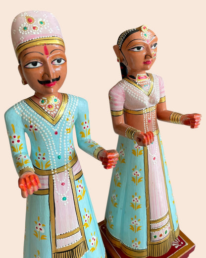 Royal Pastel Isar & Gangaur Hand-Painted Wooden Figurines – Set of 2