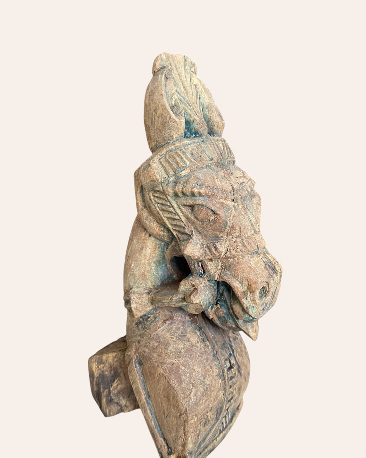 hand-carved wooden horse bracket on iron stand
