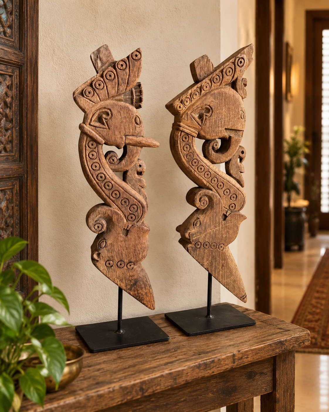 vintage hand-carved elephant yali brackets on iron stand – set of 2
