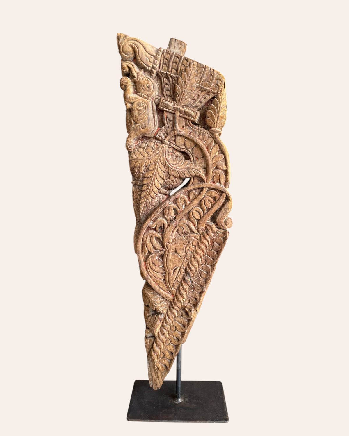 vintage hand-carved yali sculpture on iron stand