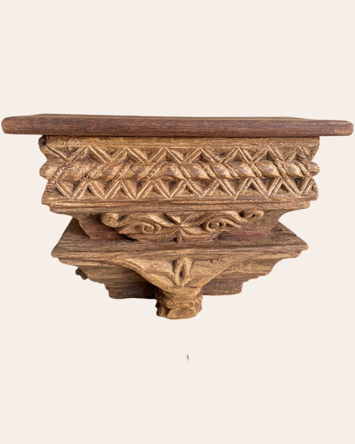 hand-carved geometric wooden corbel wall shelf