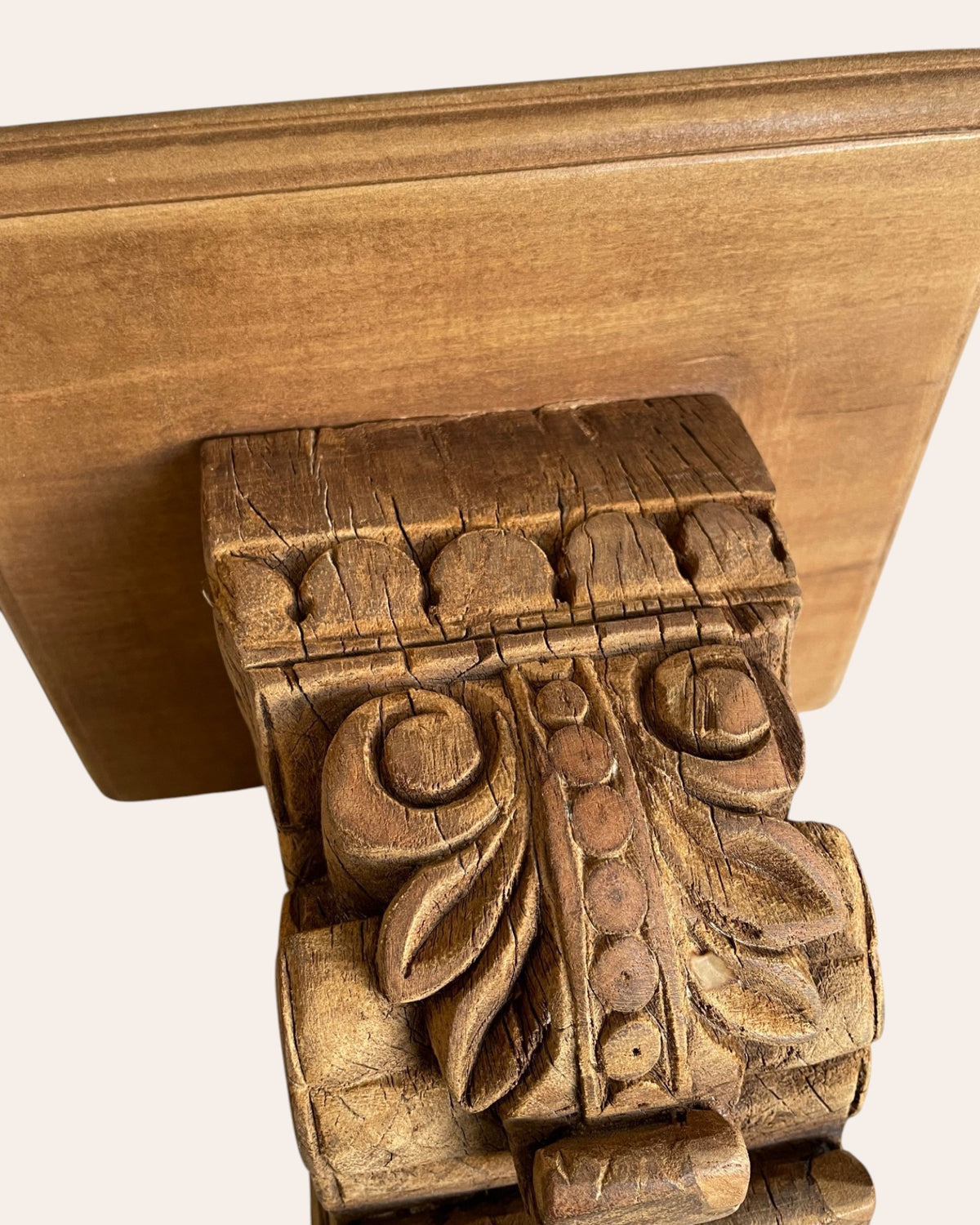 old scrollwork wooden wall bracket