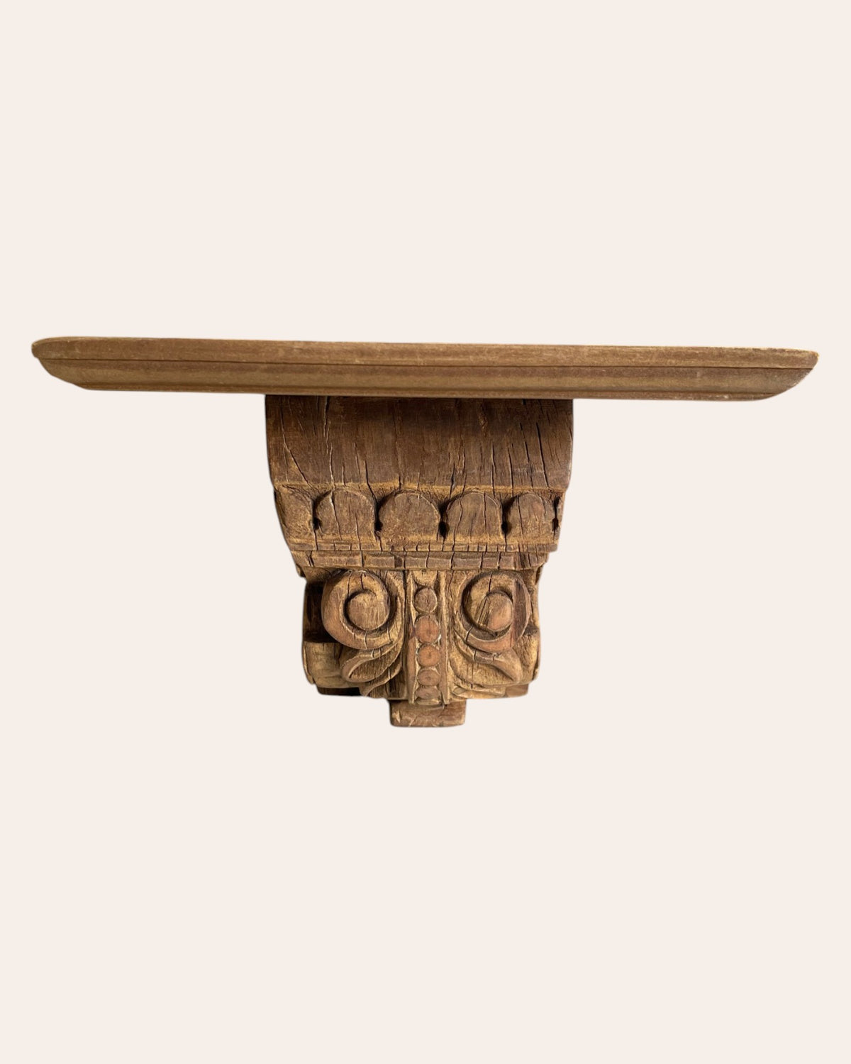 old scrollwork wooden wall bracket